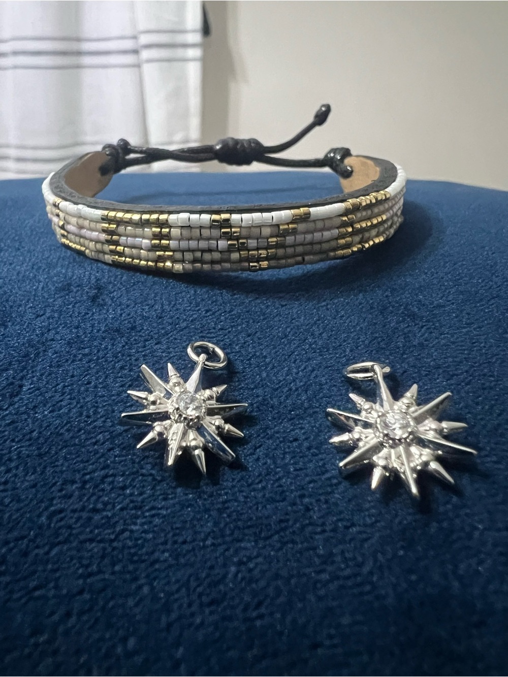 Kendra Scott White and Gold Beaded Leather Wrap Bracelet with Silver Star Charms